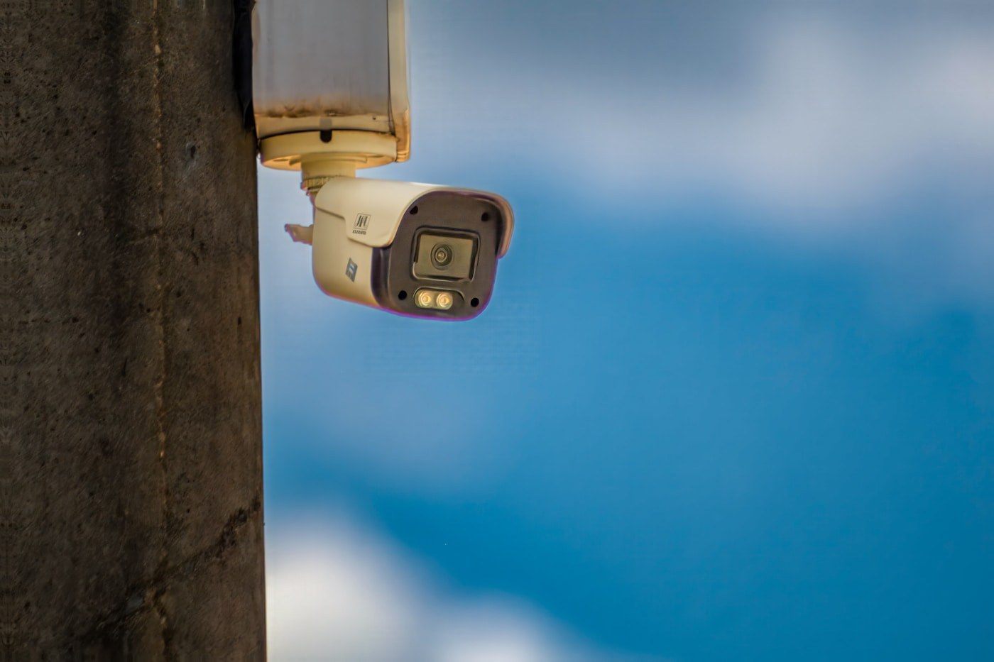 Outdoor CCTV security camera mounted on a wall